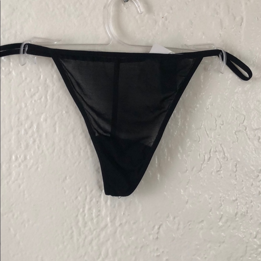 NWT Elegant See Through G String Panty.
